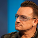 Illustration for article titled Woman Who Saved Bono Trolls Audience at U2 Concert, Is Booed Off Stage